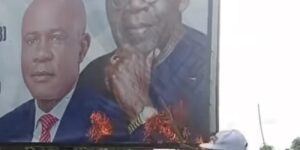 ANGER ERUPTS IN ENUGU AS YOUTHS BURN TINUBU, MBAH CAMPAIGN BILLBOARDS, REJECT APC, PDP; NDC ASPIRANT OTI DENOUNCES ATTACK, CALLS FOR FULL INVESTIGATION